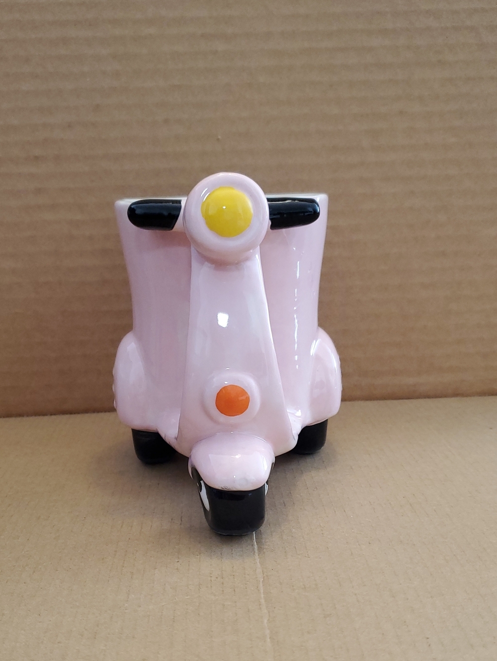 Cracker Barrel Pink Scooter Toy with Yellow and Orange Accents